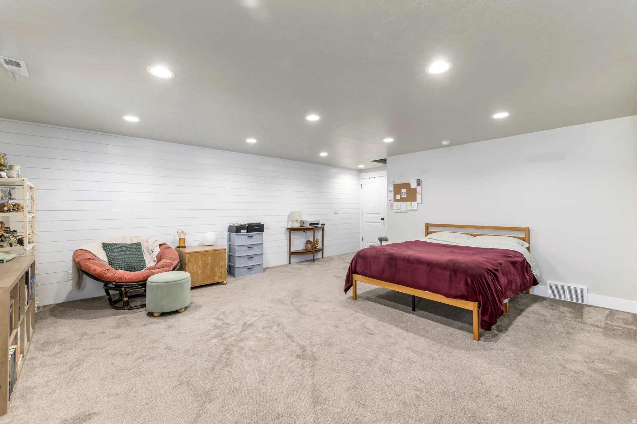 Family room currently being used as a bedroom in basement