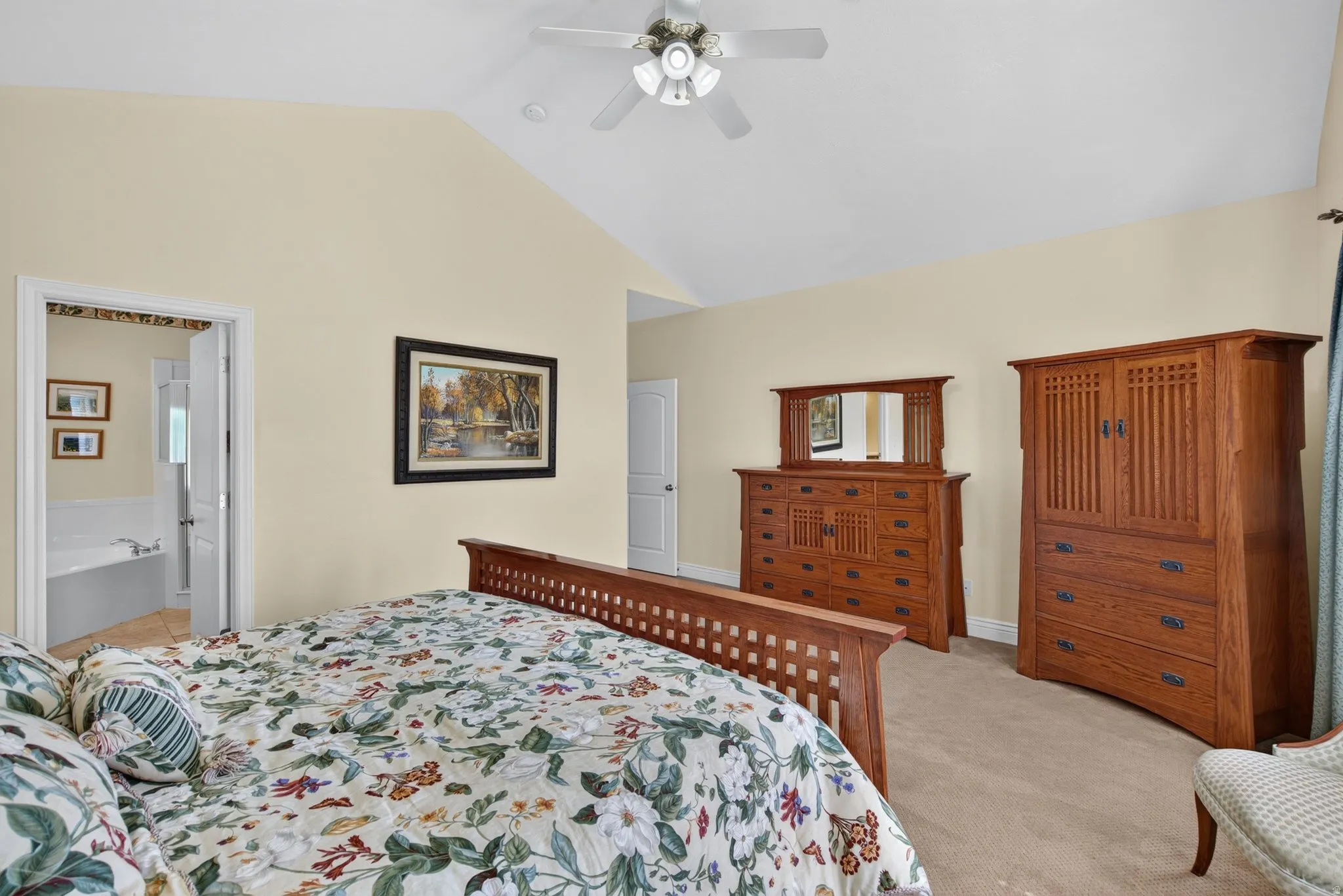 Vaulted ceiling with an overhead fan