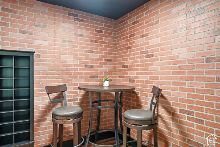 Exposed brick walls provide a rustic aesthetic
