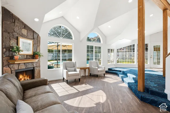Vaulted ceilings and abundant natural light highlight this spacious living area