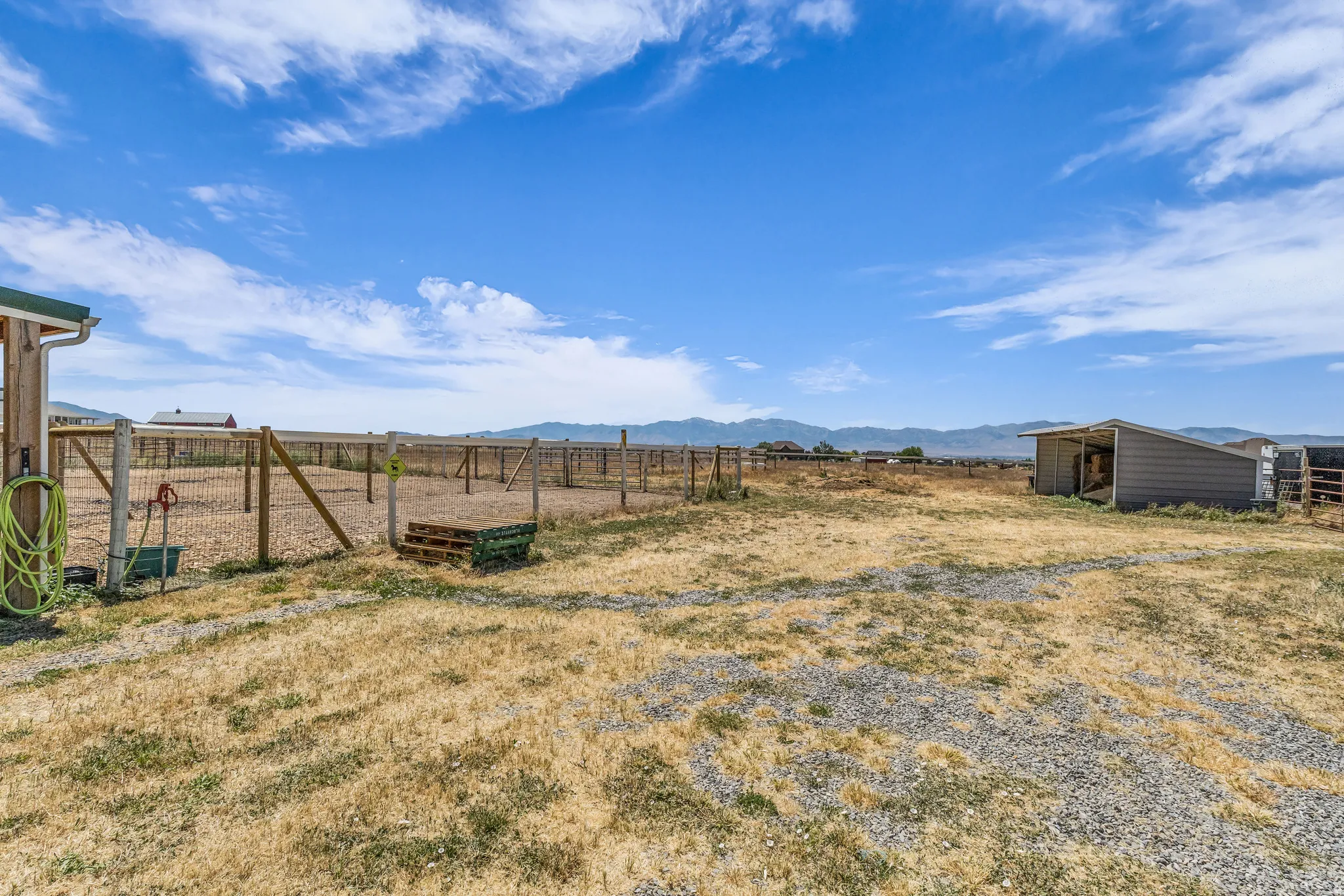 West of barn with hay storage