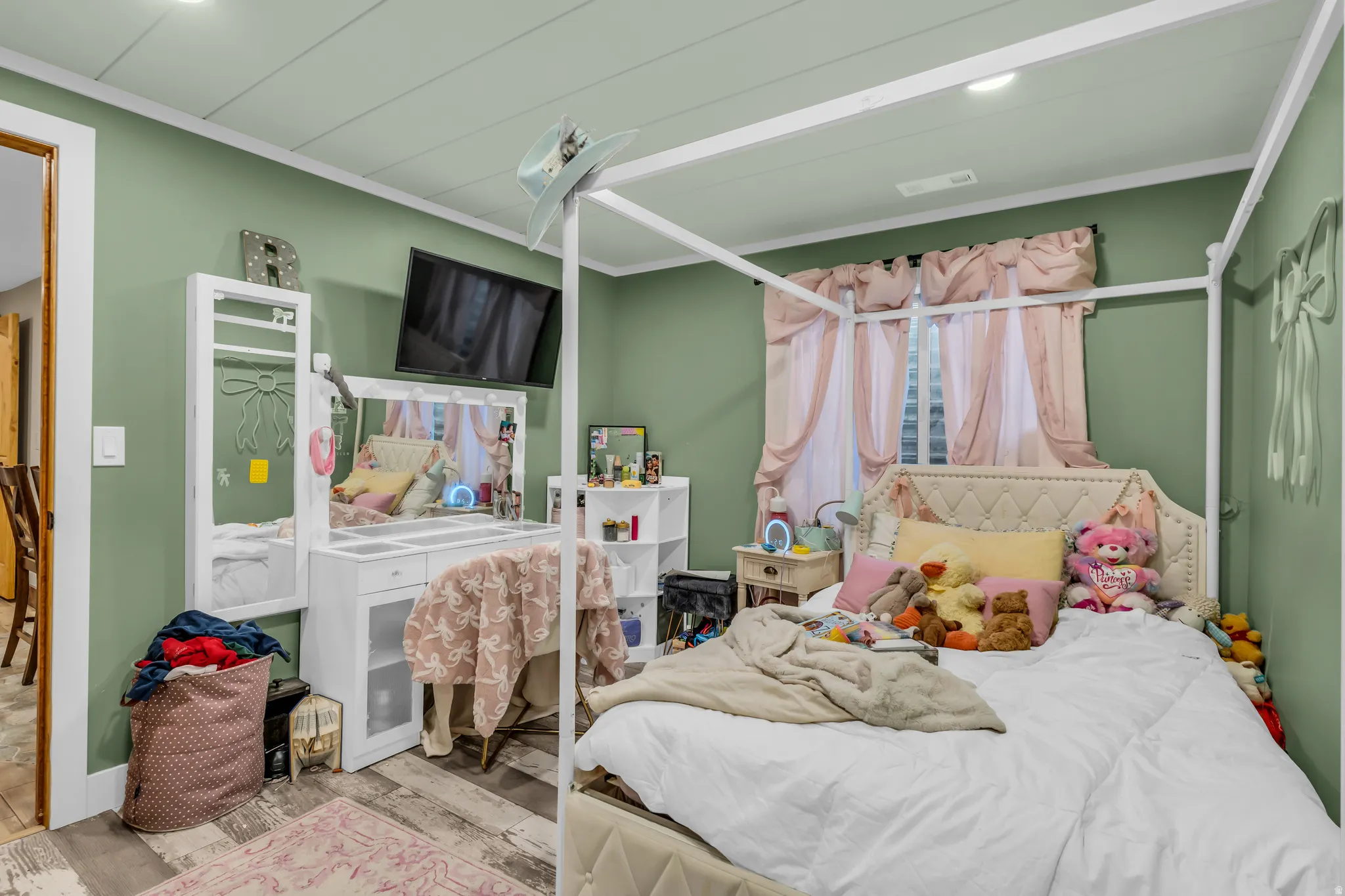 Interior room with green painted walls and white trim