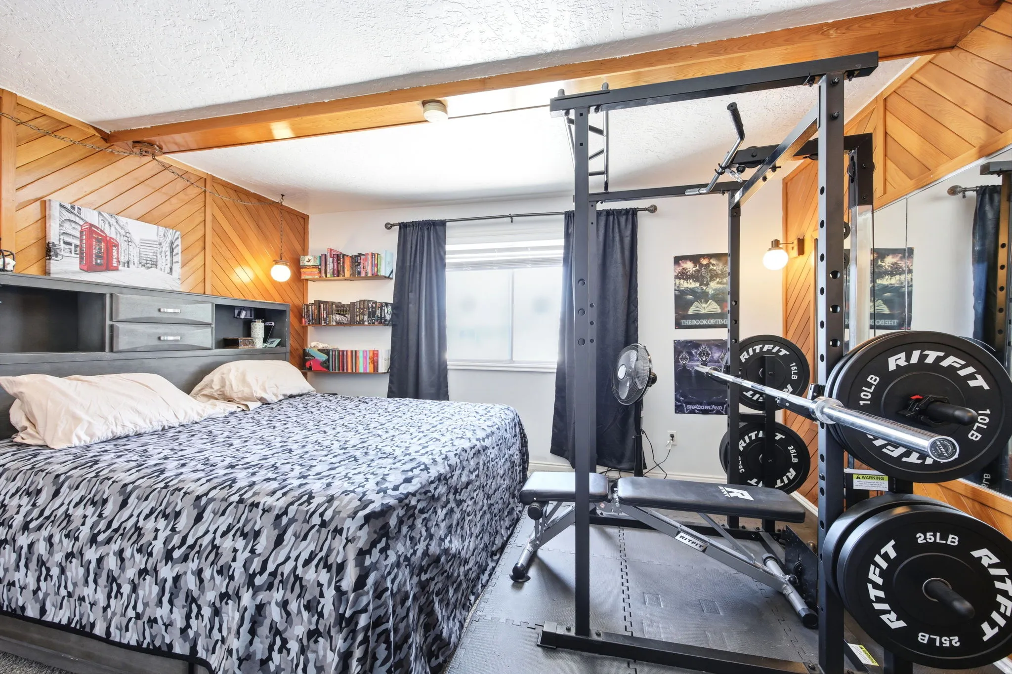 Room featuring a built-in bed frame with integrated storage and shelving