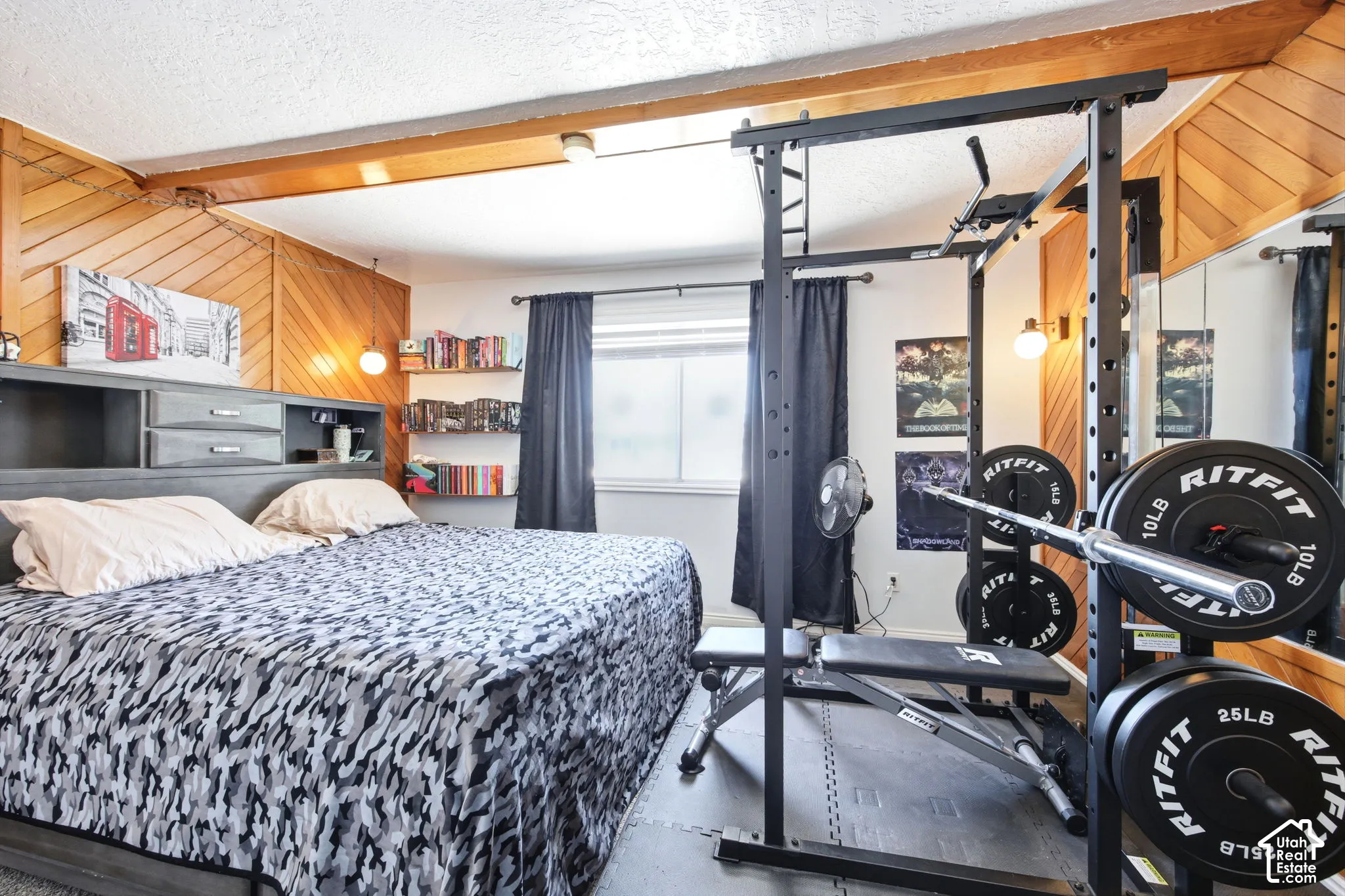 Room featuring a built-in bed frame with integrated storage and shelving