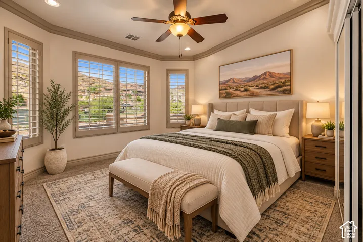 Expansive window array with shutters, ceiling fan with integrated lighting, recessed lighting, and wall-to-wall carpeting