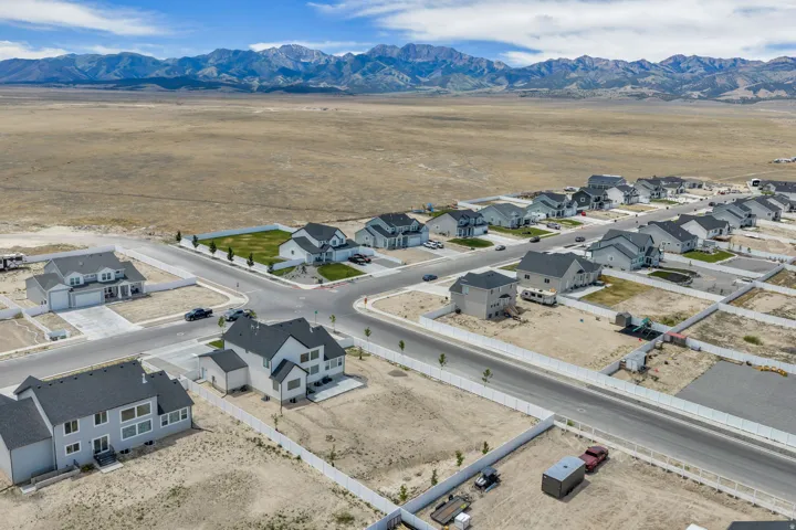 Newly constructed residential community with paved streets and sidewalks