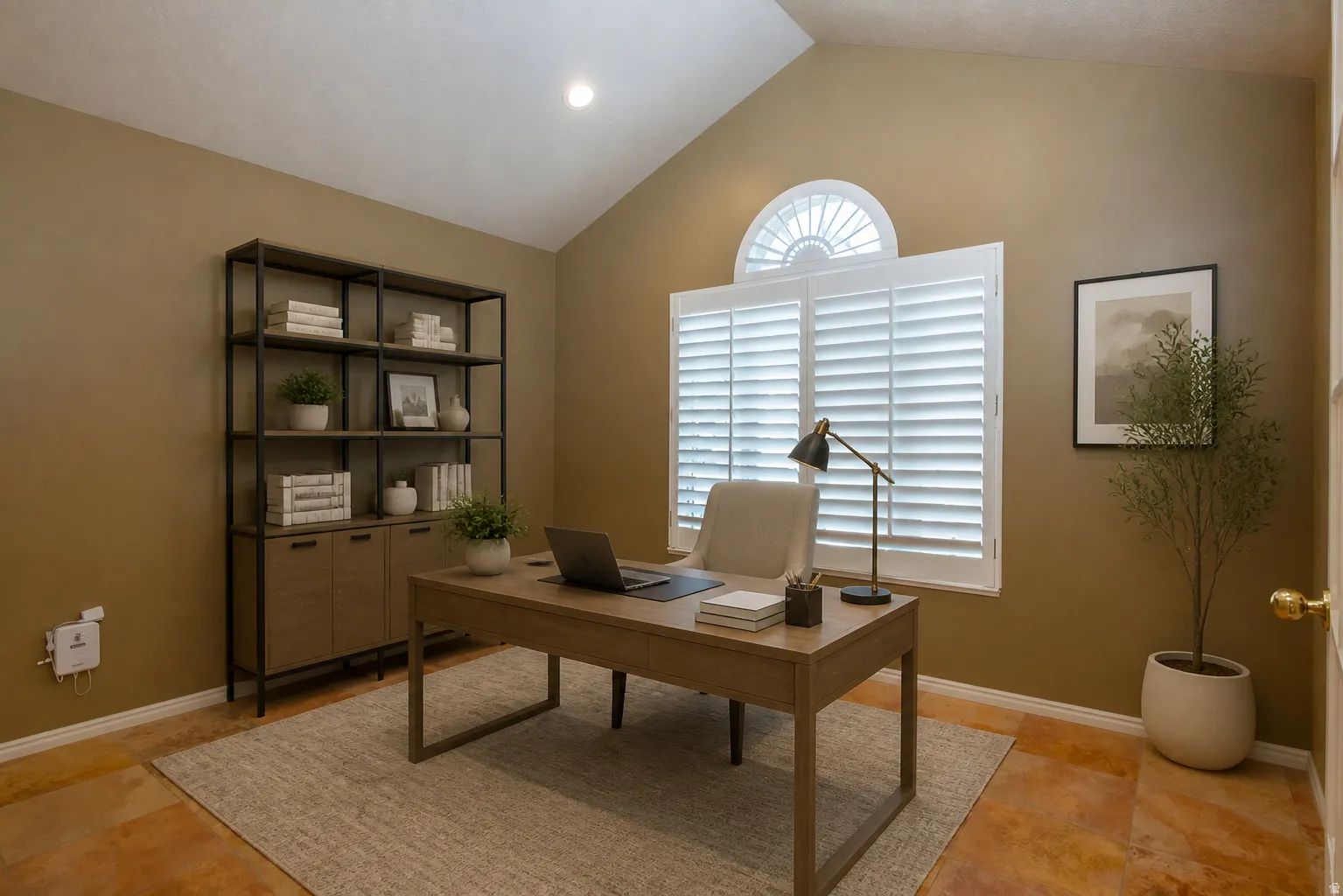Virtually Staged - Vaulted ceiling room featuring a large window with plantation shutters and an arched transom window
