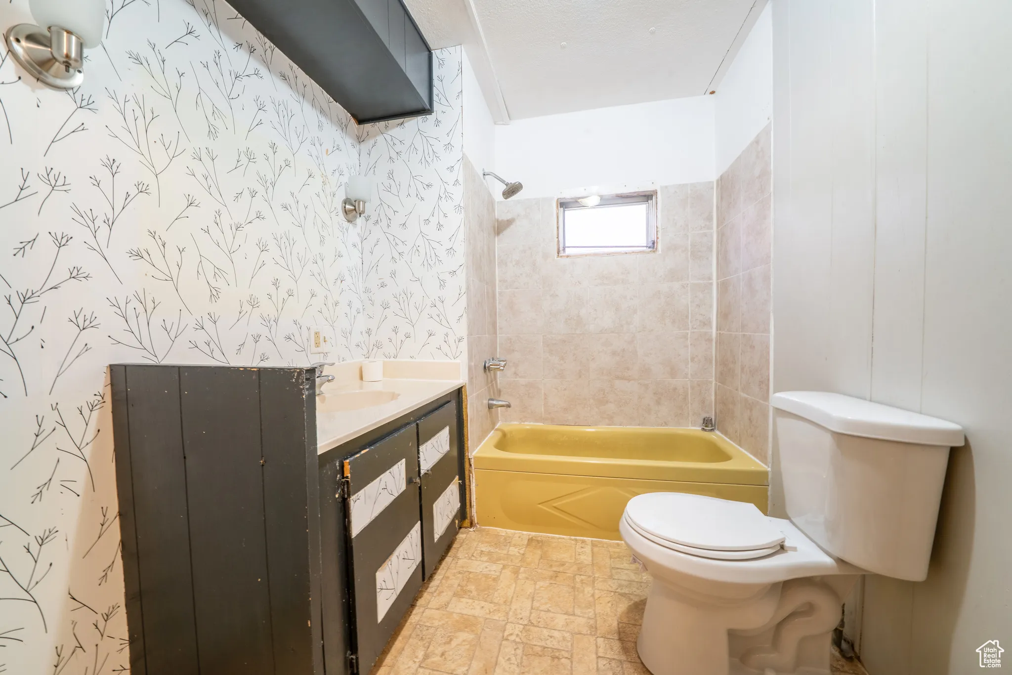 ADU Bathroom featuring a built-in vanity with a countertop and undermount sink