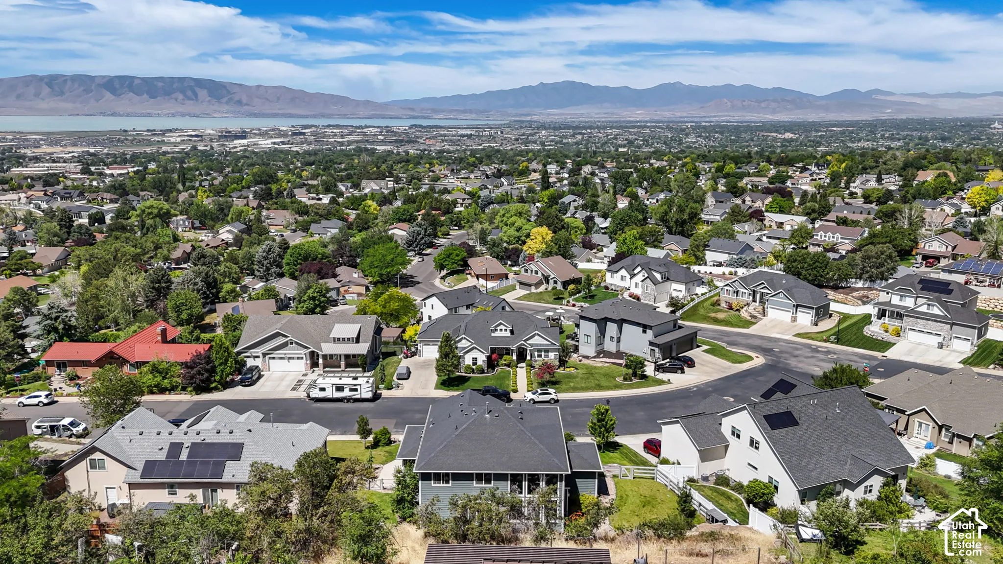 Expansive residential area featuring a variety of single-family homes, mature landscaping, and paved streets