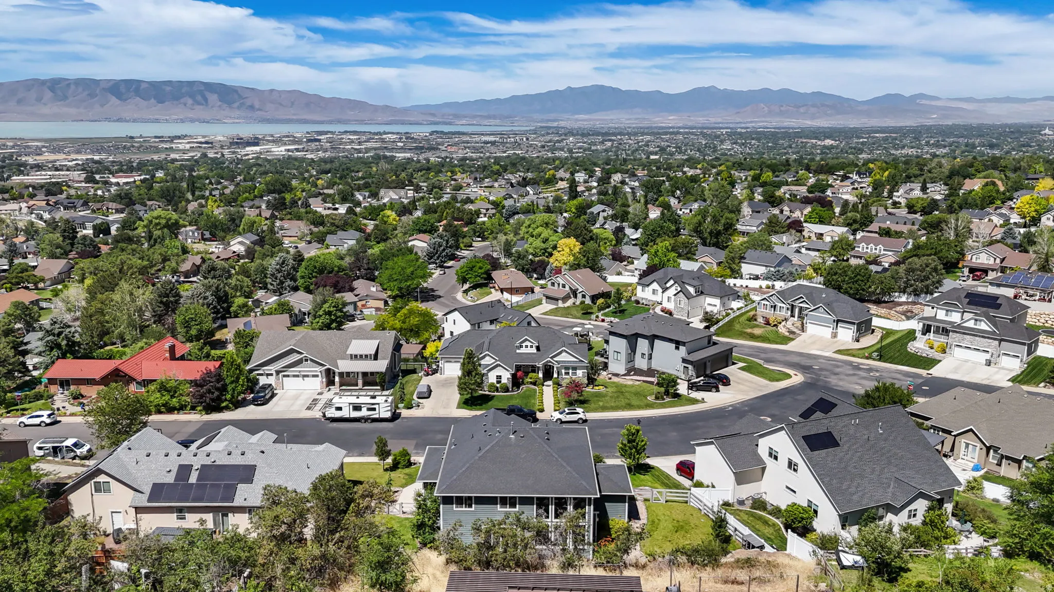 Expansive residential area featuring a variety of single-family homes, mature landscaping, and paved streets