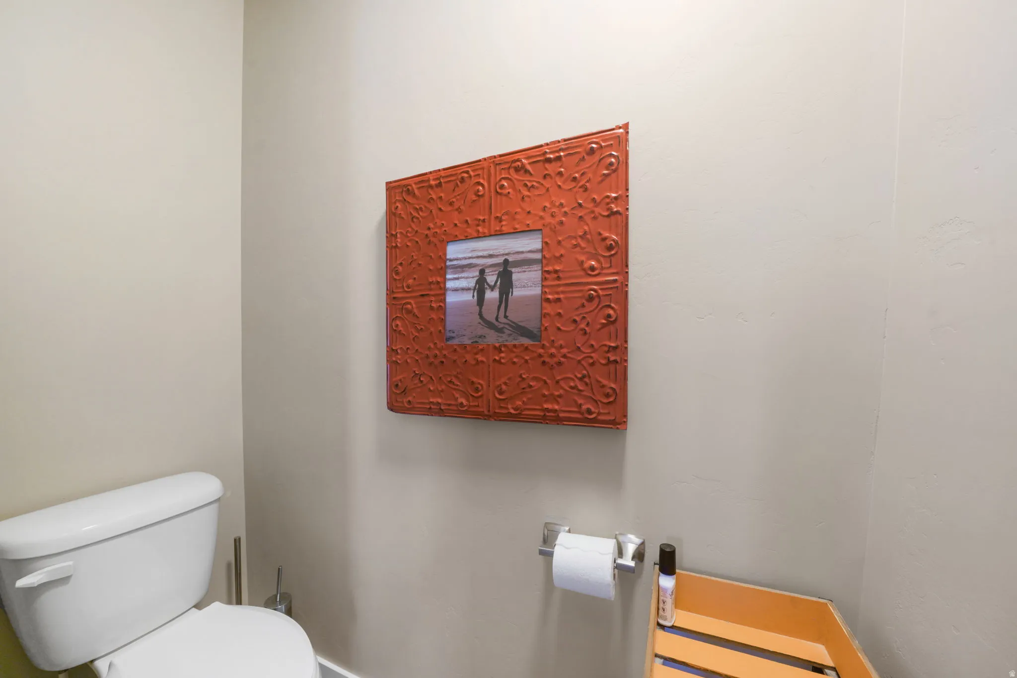 White toilet with a matching tank