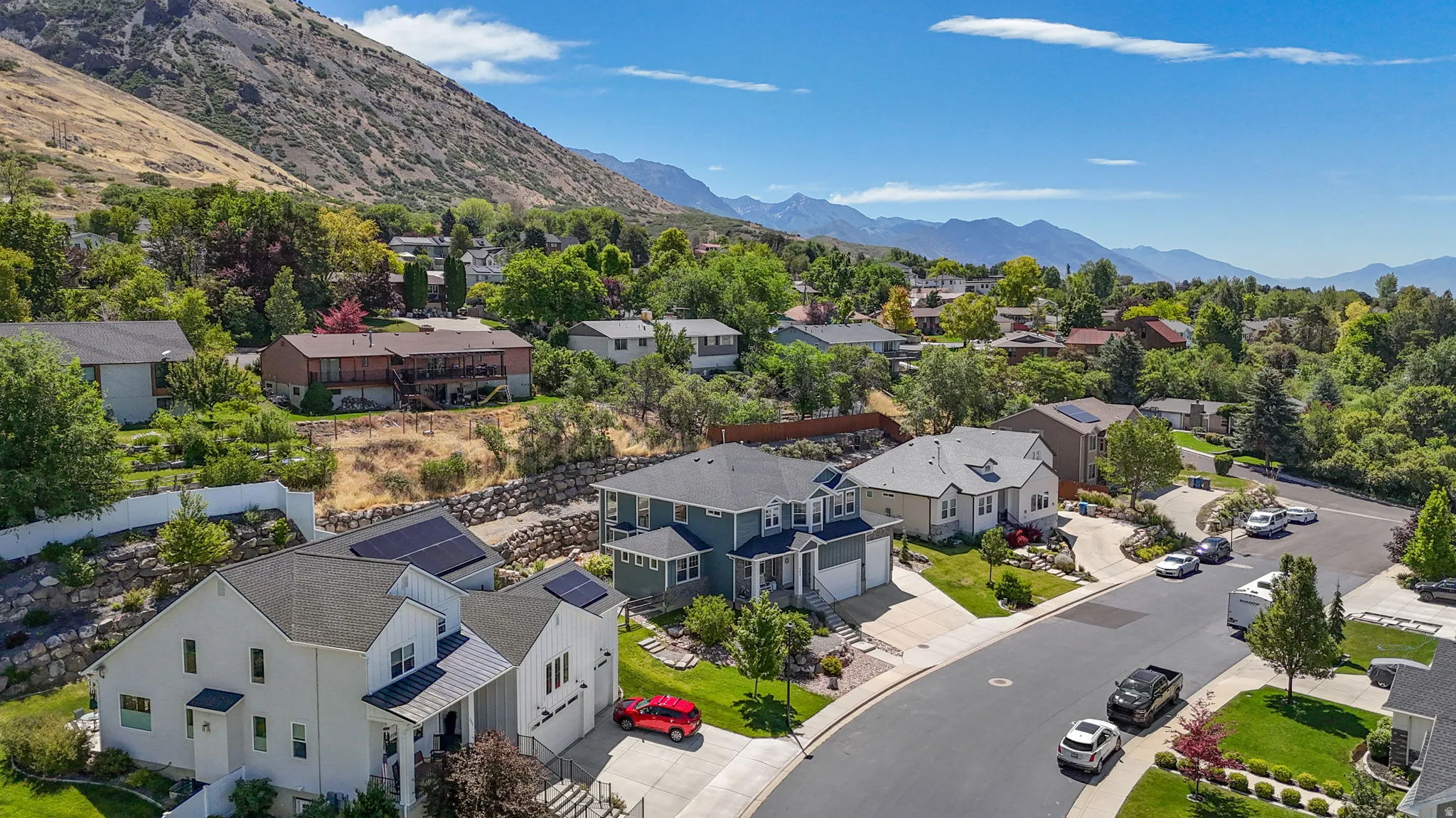 Residential street with a mountain backdrop