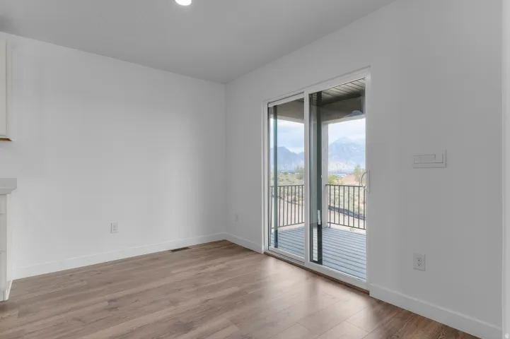Sliding glass door leading to an outdoor balcony