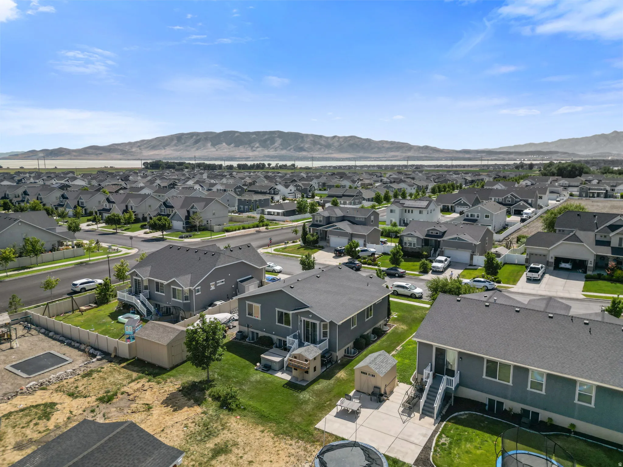 Aerial perspective of a developed residential community with numerous single-family homes