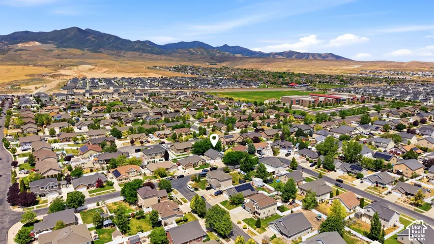 Expansive residential neighborhood with distant mountain ranges