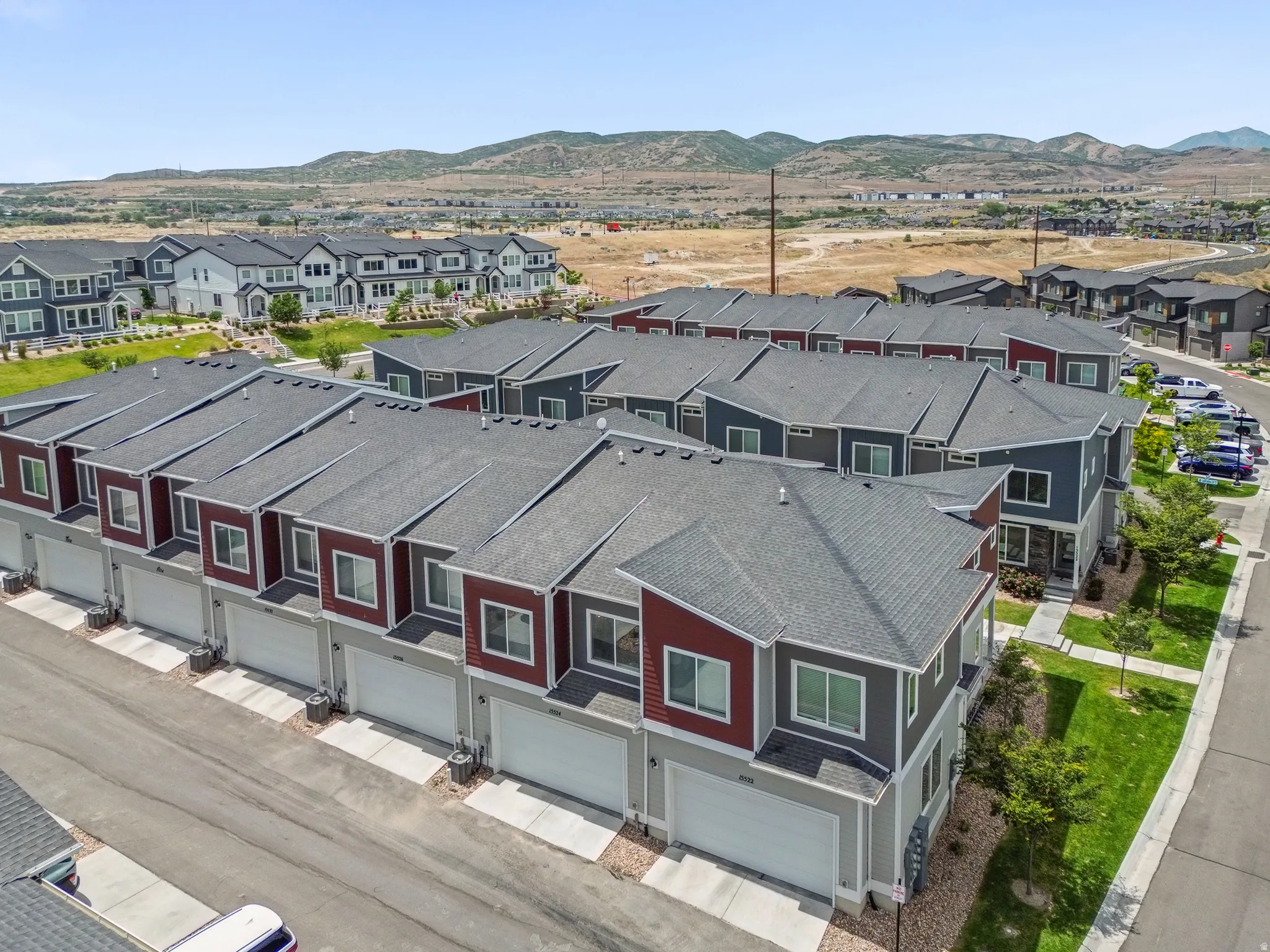 Contemporary townhome development featuring multi-level units