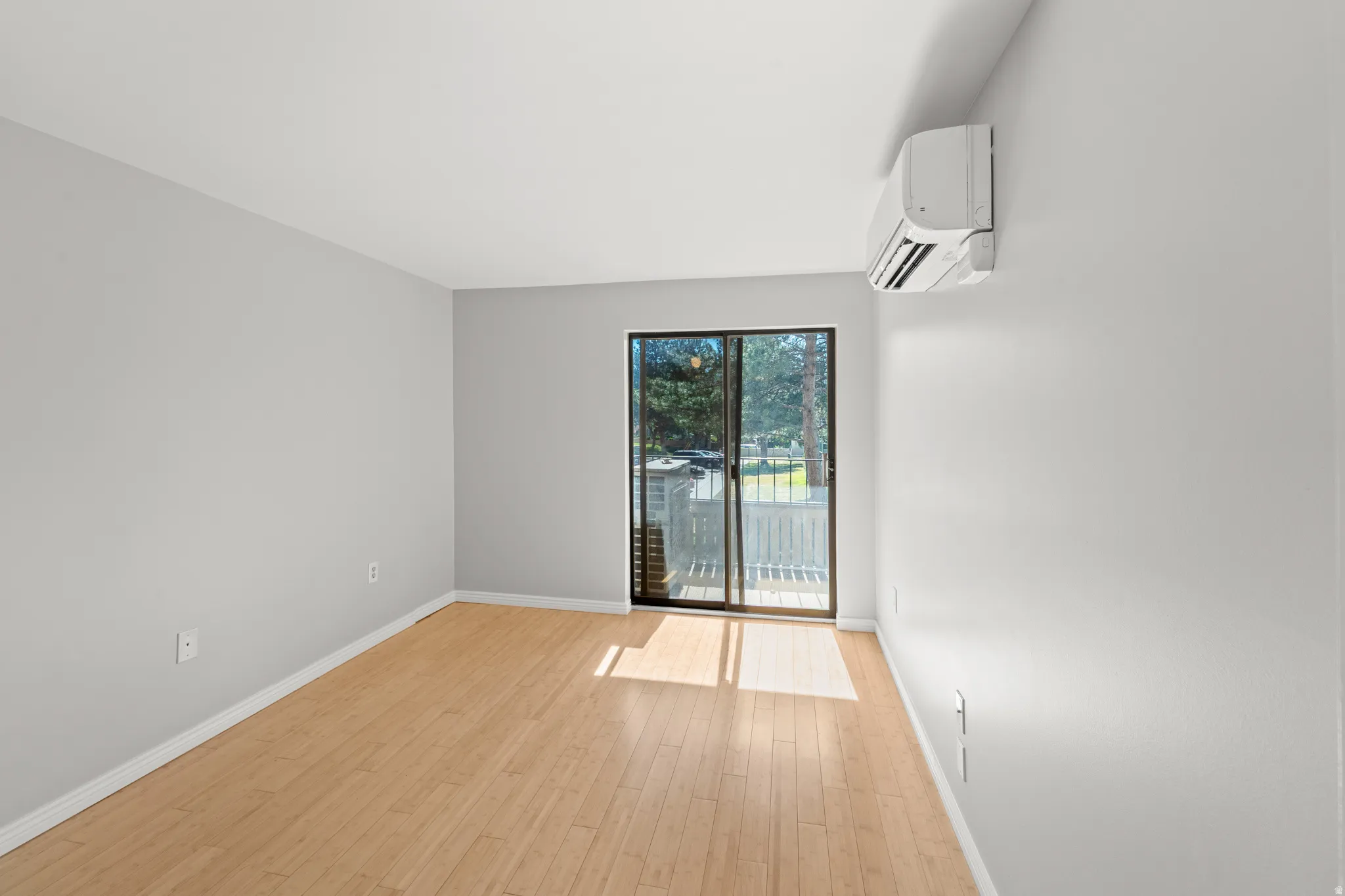 Spacious primary bedroom provides a peaceful retreat after a busy day.