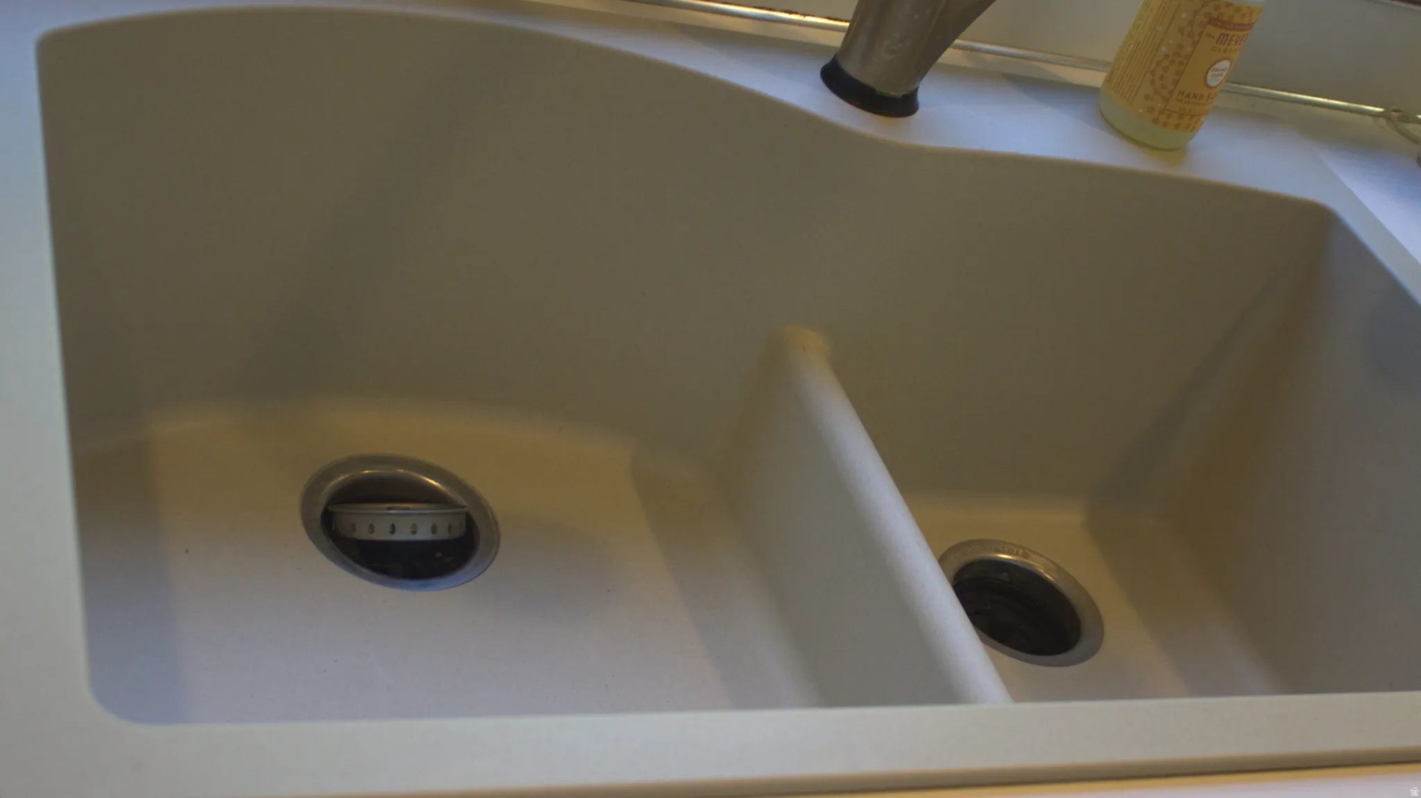 Double basin kitchen sink with integrated garbage disposal