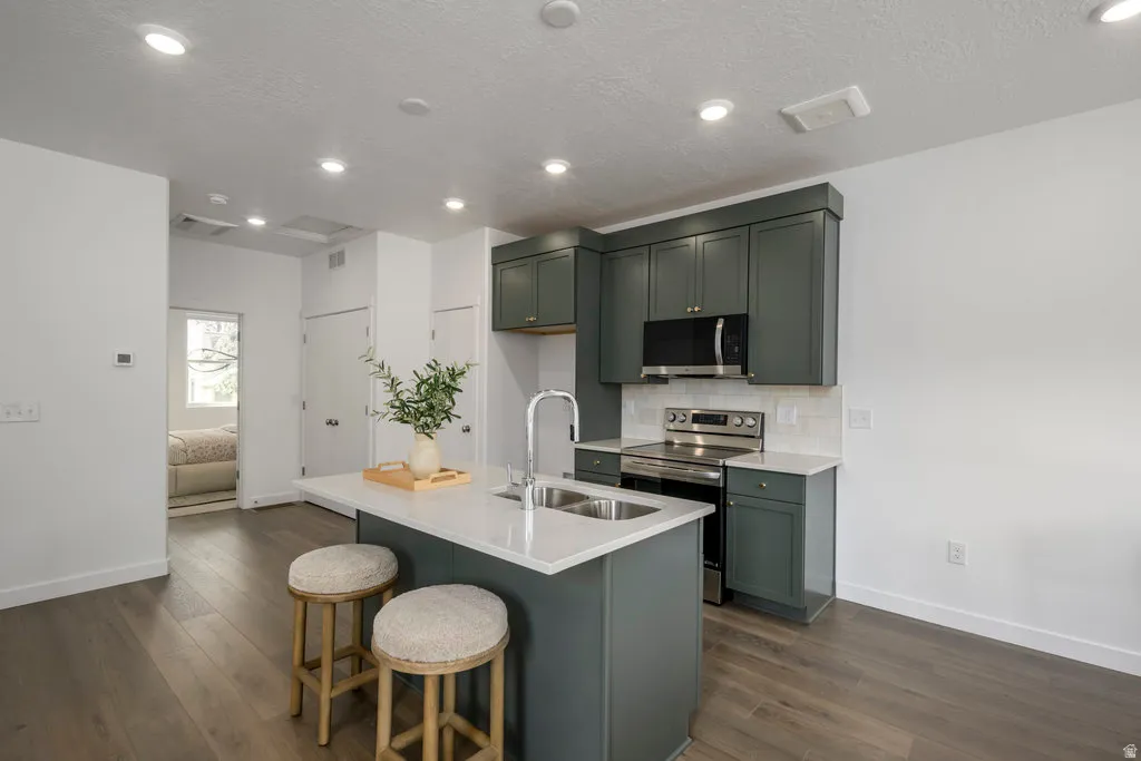 Whether it’s a quick breakfast or dinner with friends, this kitchen makes it easy. *model home
