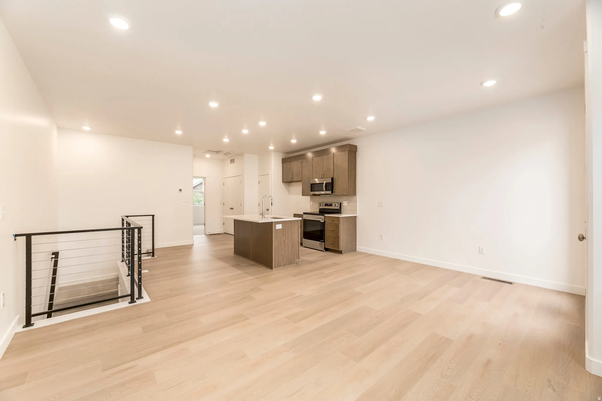 Whether it’s a quick breakfast or dinner with friends, this kitchen makes it easy. *model home