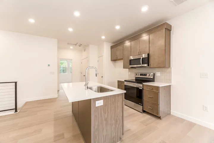 Whether it’s a quick breakfast or dinner with friends, this kitchen makes it easy. *model home