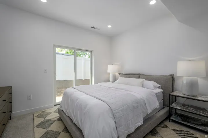 Drift off in a room designed for peaceful nights and bright mornings. *model home
