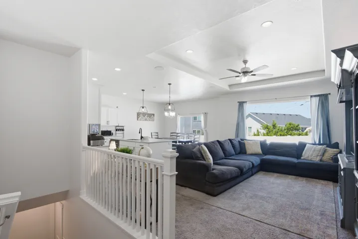Open-concept living space featuring a spacious living room and kitchen