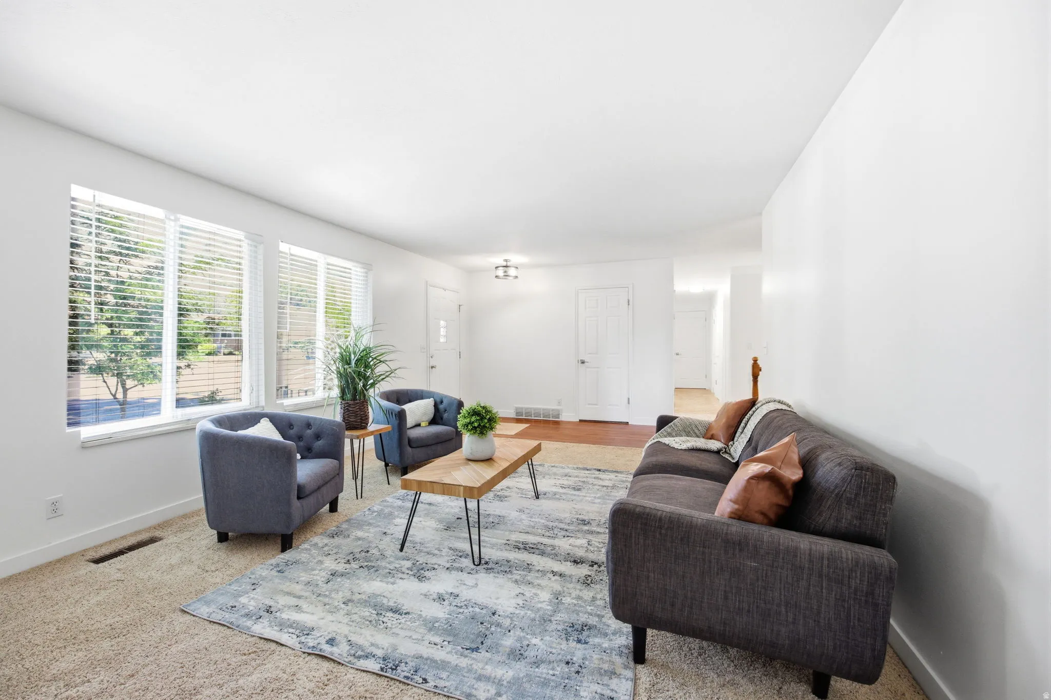 Bright living area with multiple windows