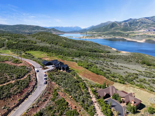 Mountainous landscape featuring a prominent lake and distant peaks
