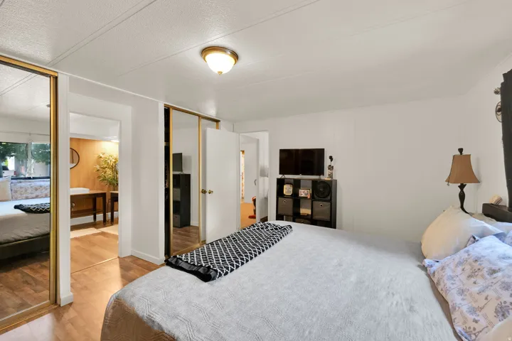 Master Bedroom with white walls and a textured ceiling