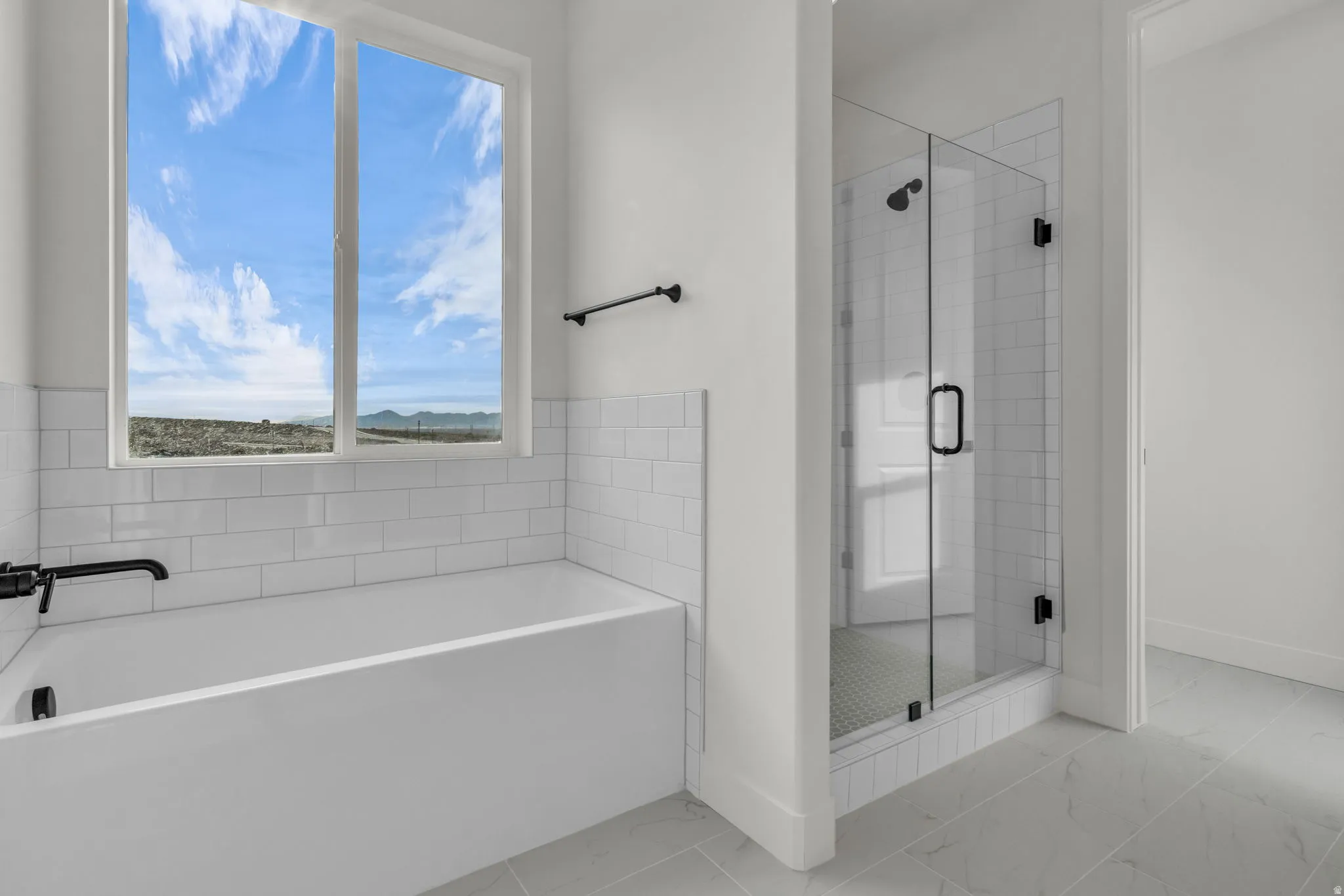 Soaker tub and Euro shower as part of primary bath.