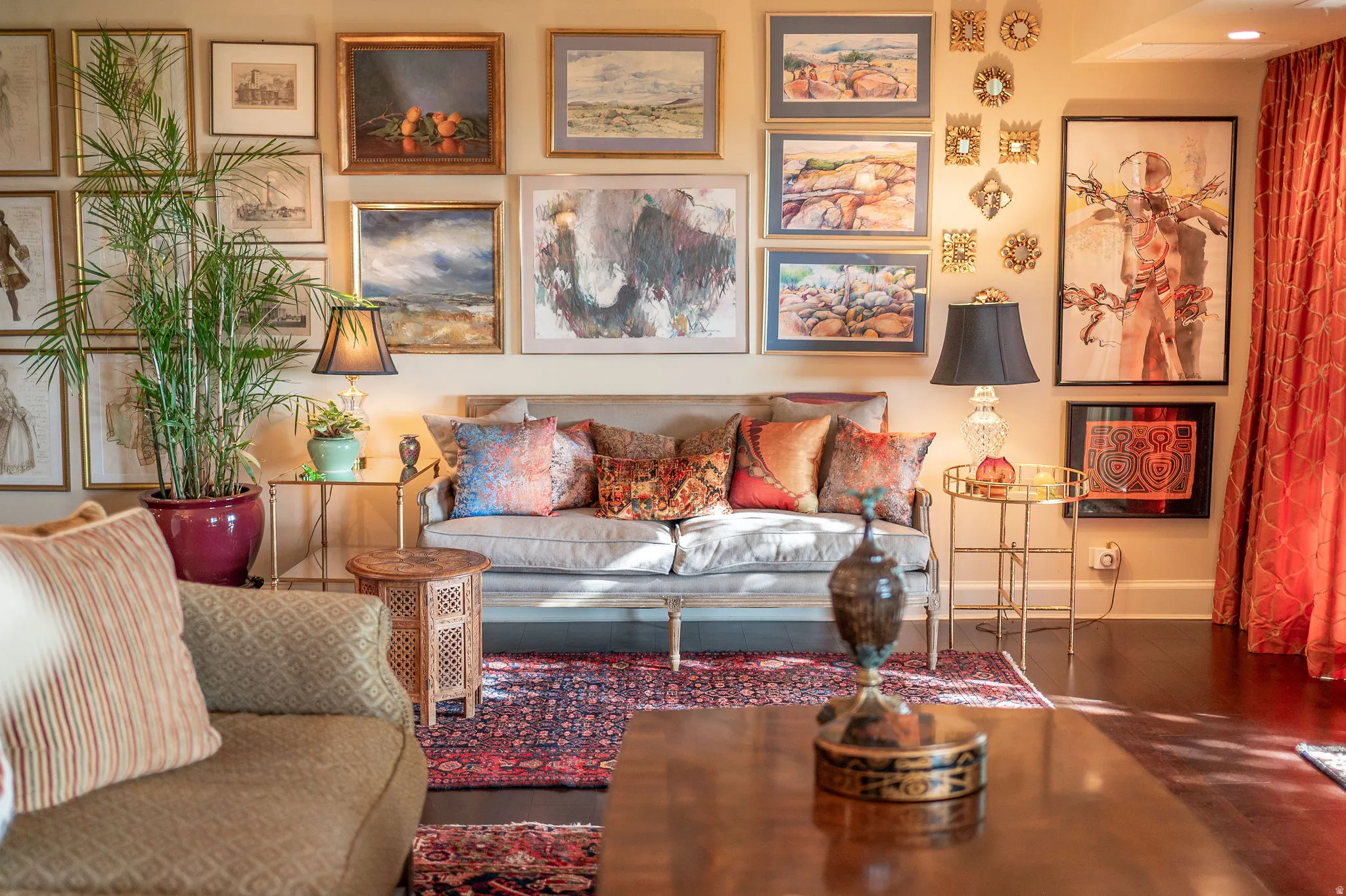 Warm living space featuring rich wood-finish flooring