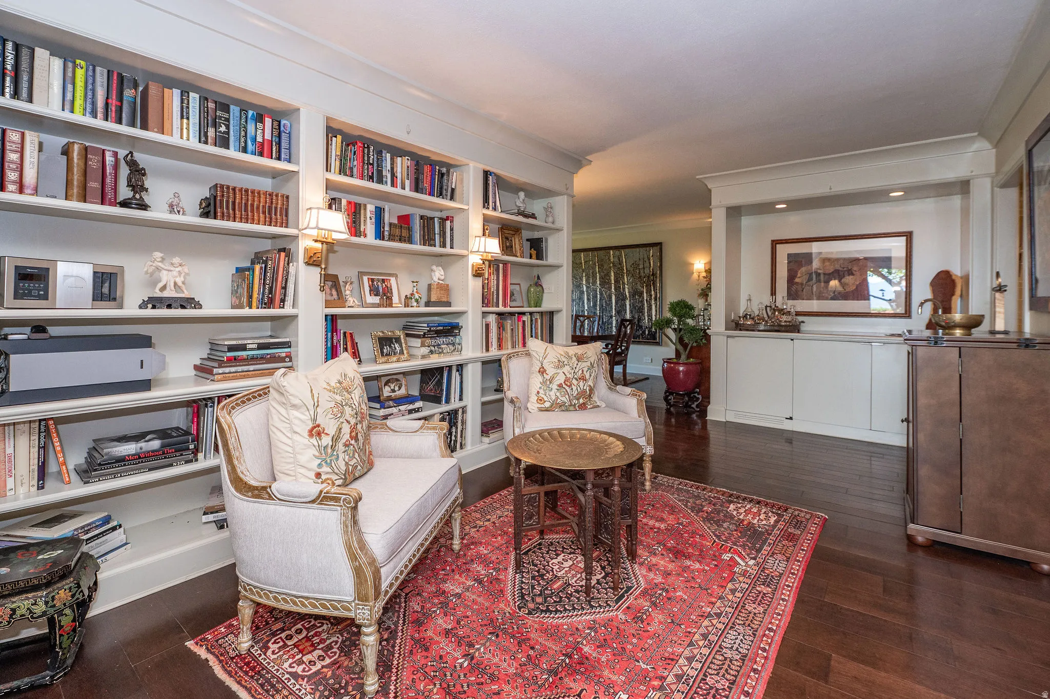 Built-in shelving with integrated sconce lighting