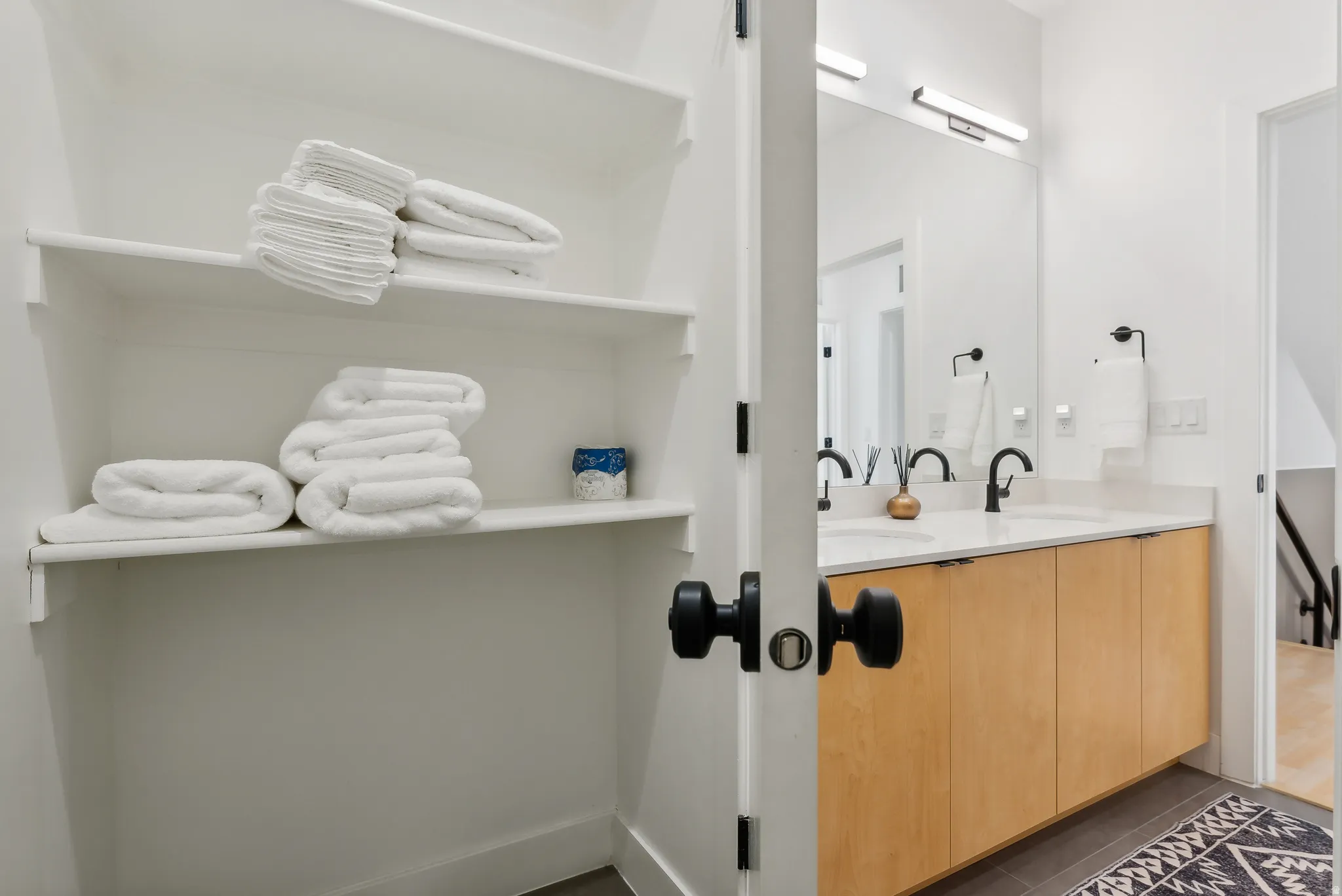 Built-in shelving unit with multiple tiers
