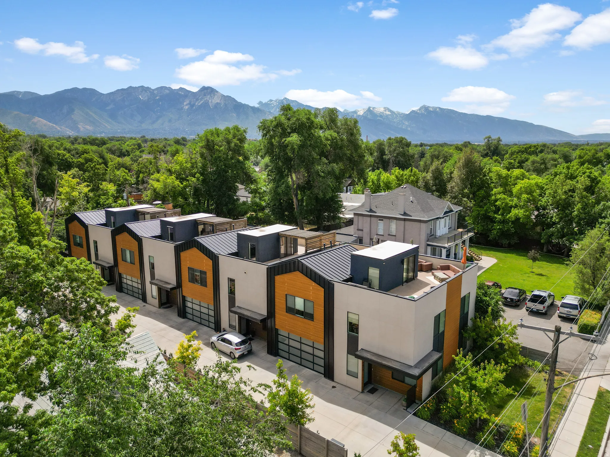 Modern multi-level townhomes featuring clean lines and a contemporary facade
