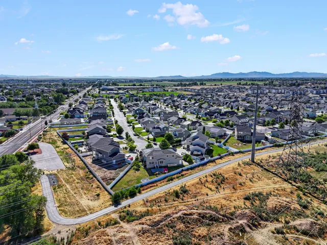 Expansive residential neighborhood featuring numerous single-family homes with pitched roofs and established landscaping
