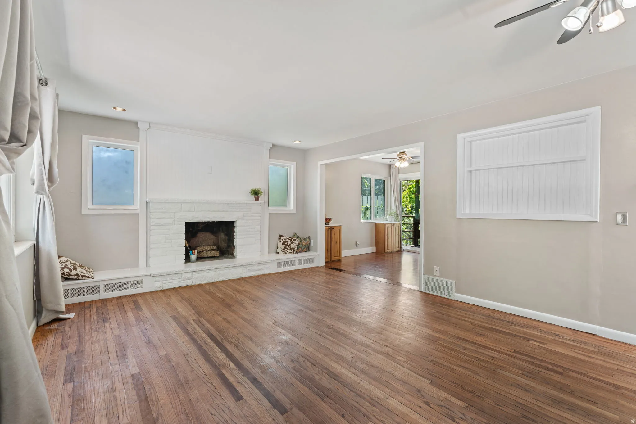 Living area featuring original hardwood flooring finished with Danish oil to give a natural wood feel underfoot.