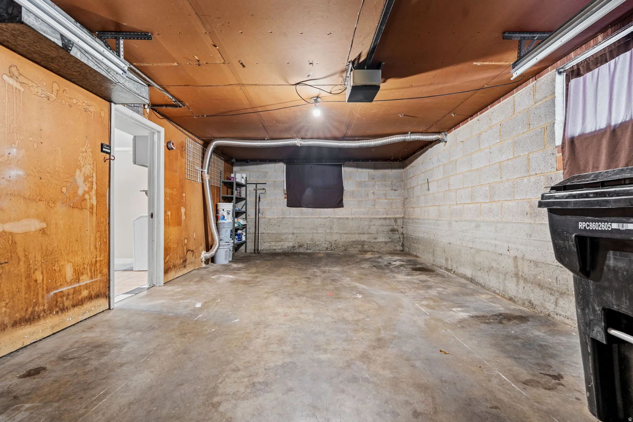 Concrete slab flooring in garage