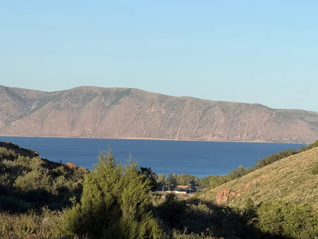 Distant water body with mountainous backdrop