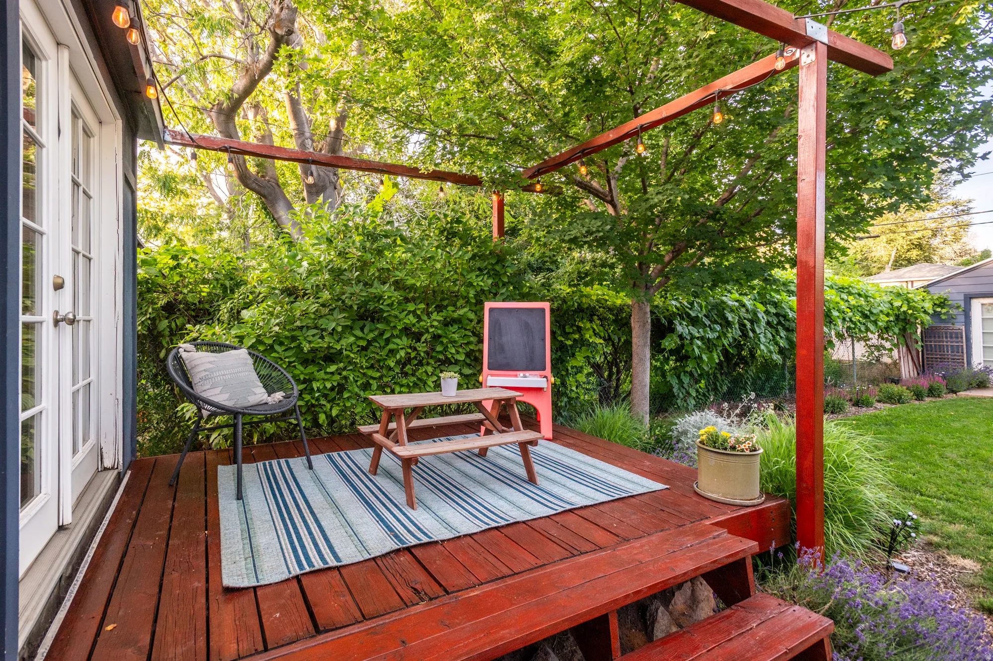 Hardwood deck with built-in overhead lighting