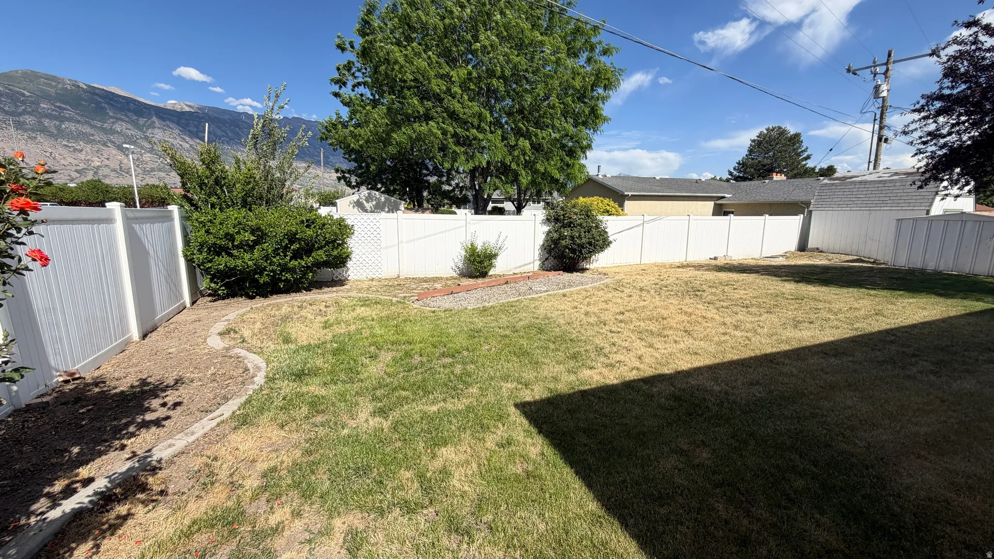 Backyard showing a mountain backdrop