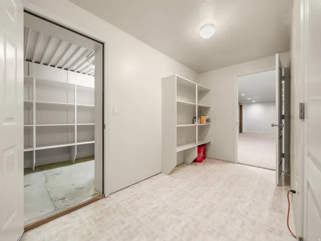 Dedicated storage area behind safe door.