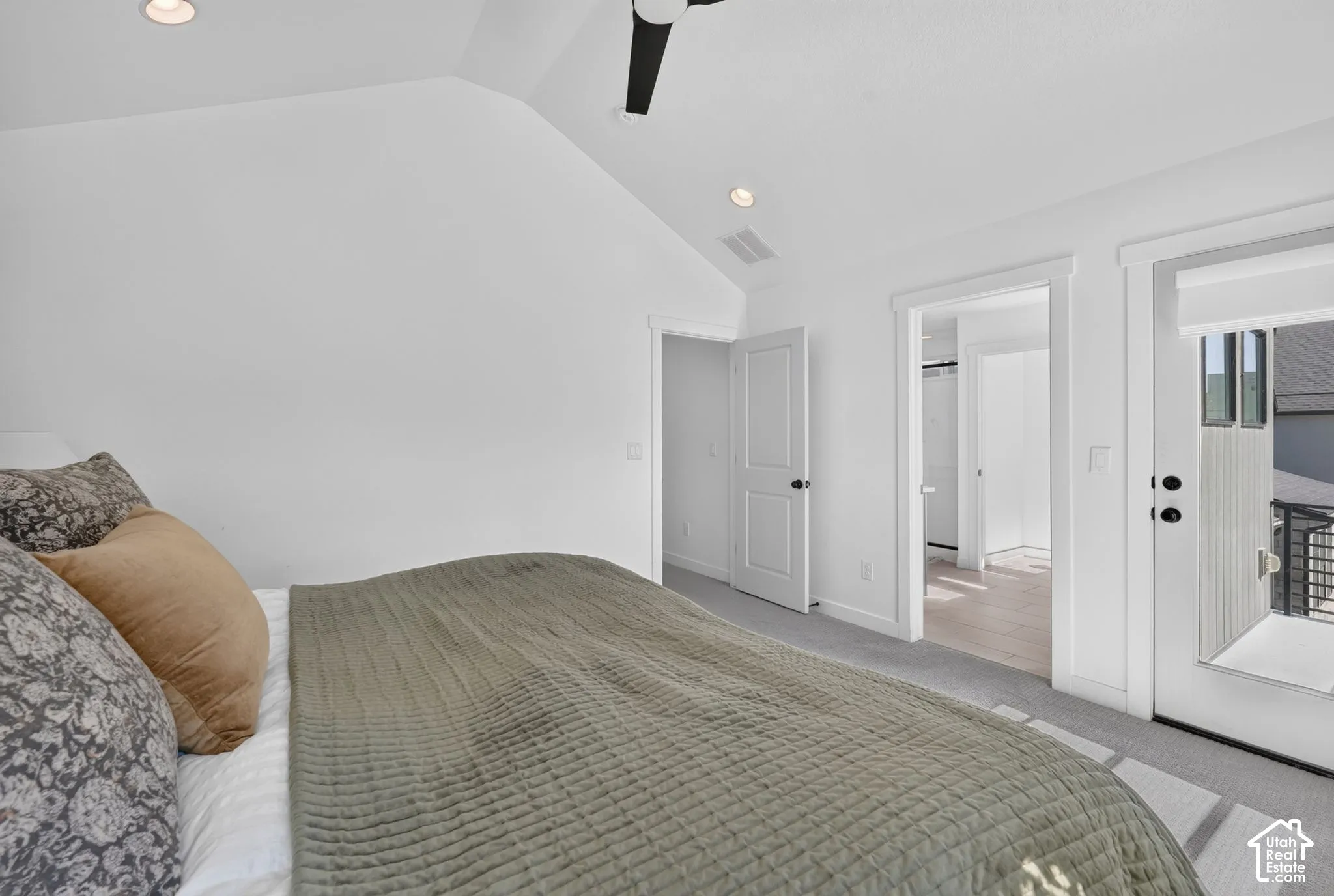Bedroom featuring a vaulted ceiling with recessed lighting, a modern ceiling fan, and light gray carpet flooring