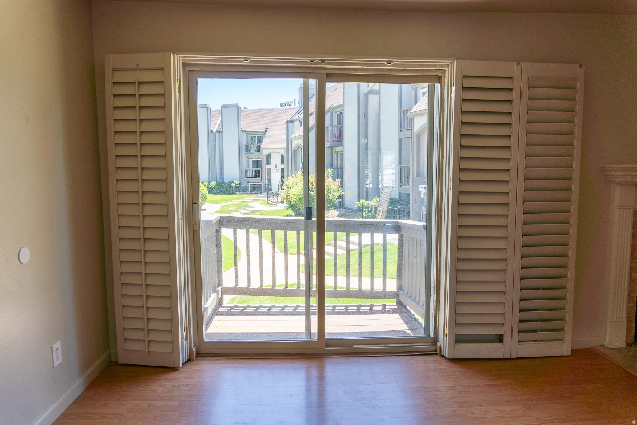 Sliding glass door opening to a private balcony