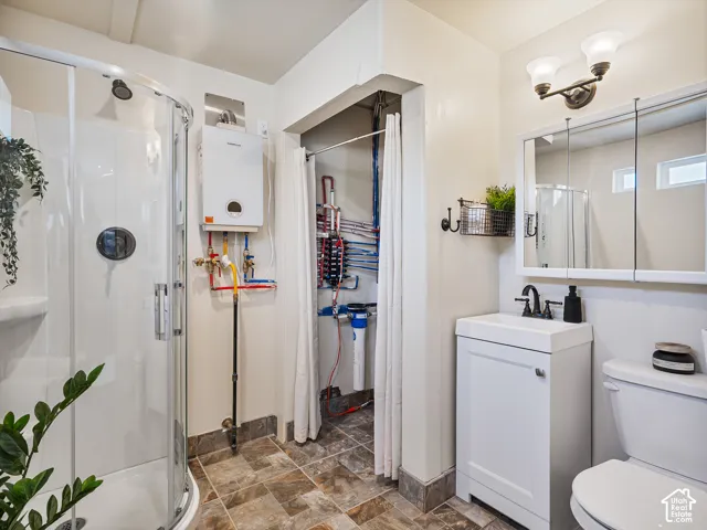 Updated bathroom, with shower, tankless water heater, and laudry hookups.