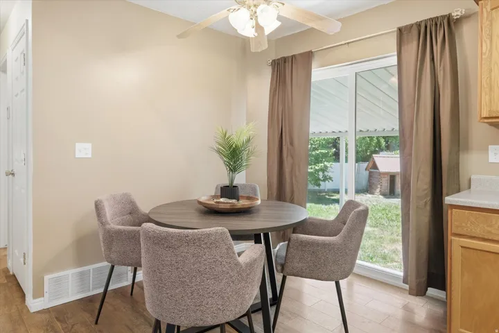 Dining area featuring wood-finish flooring and neutral wall tones