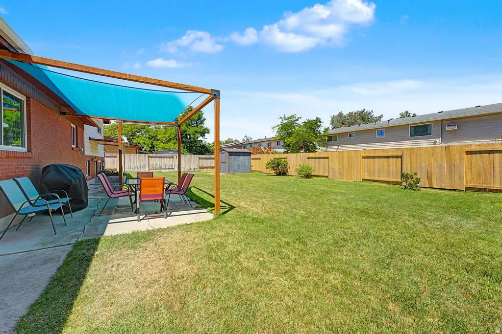 Yard with covered patio