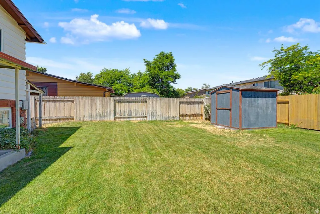 Yard with brand new back fence