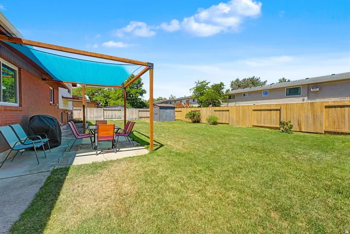 Yard with covered patio