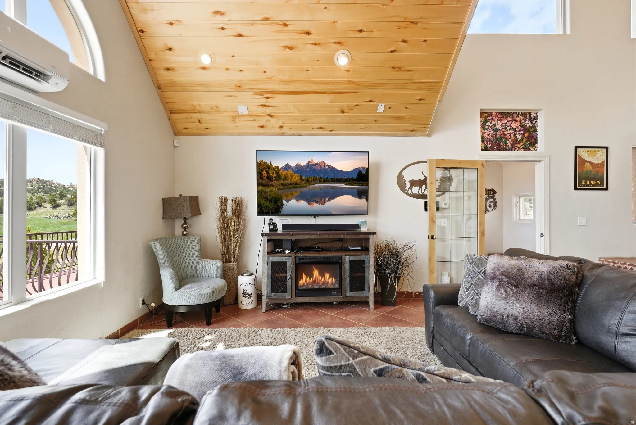 Vaulted wood-finish ceilings with recessed lighting